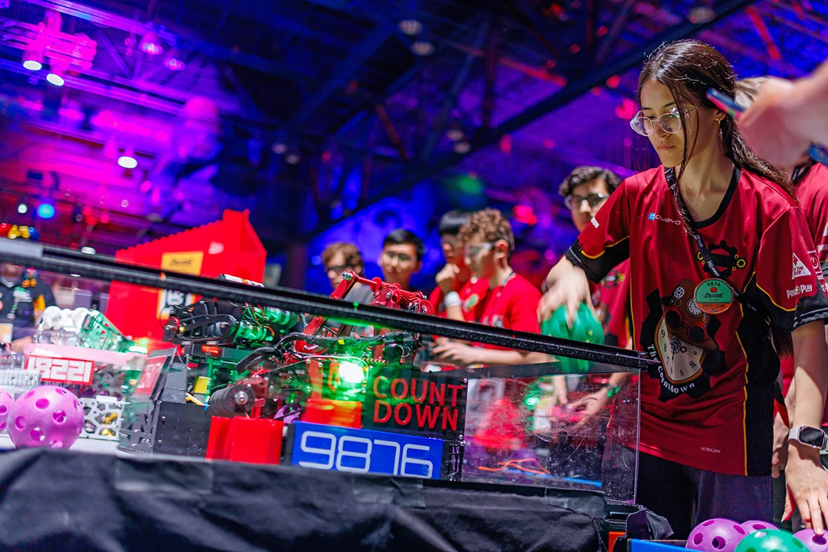 FIRST Robotics demonstration with students and robots